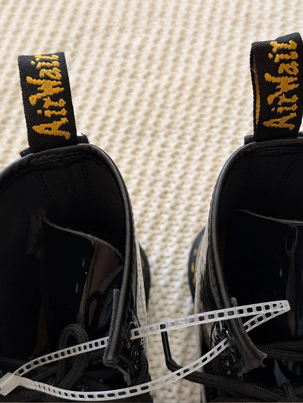 Dr. Martens Kids Black Patent Lace-Up Ankle Boots with Yellow Stitching